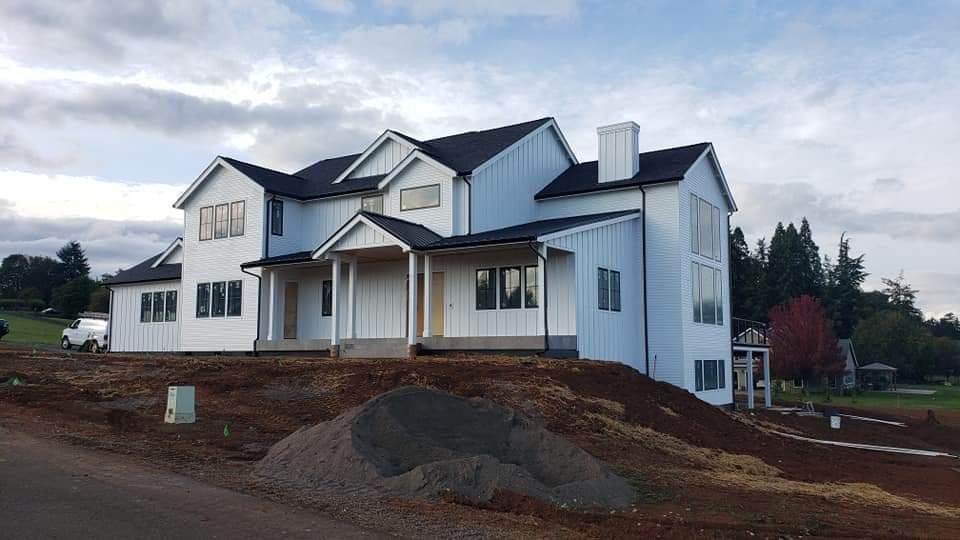 White modern farmhouse with black window frames